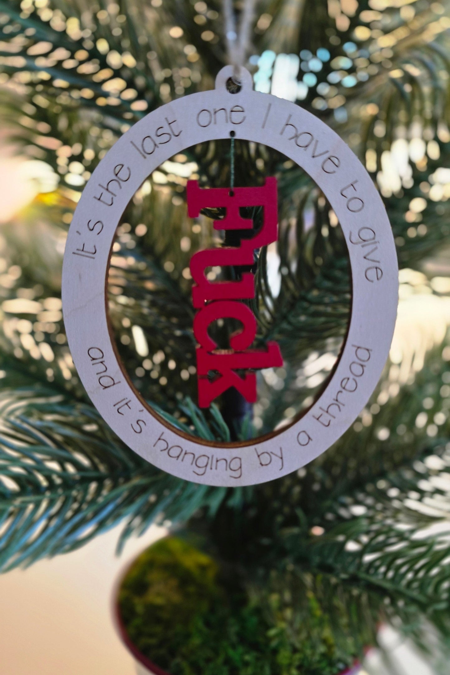 Hanging by a Thread Ornament